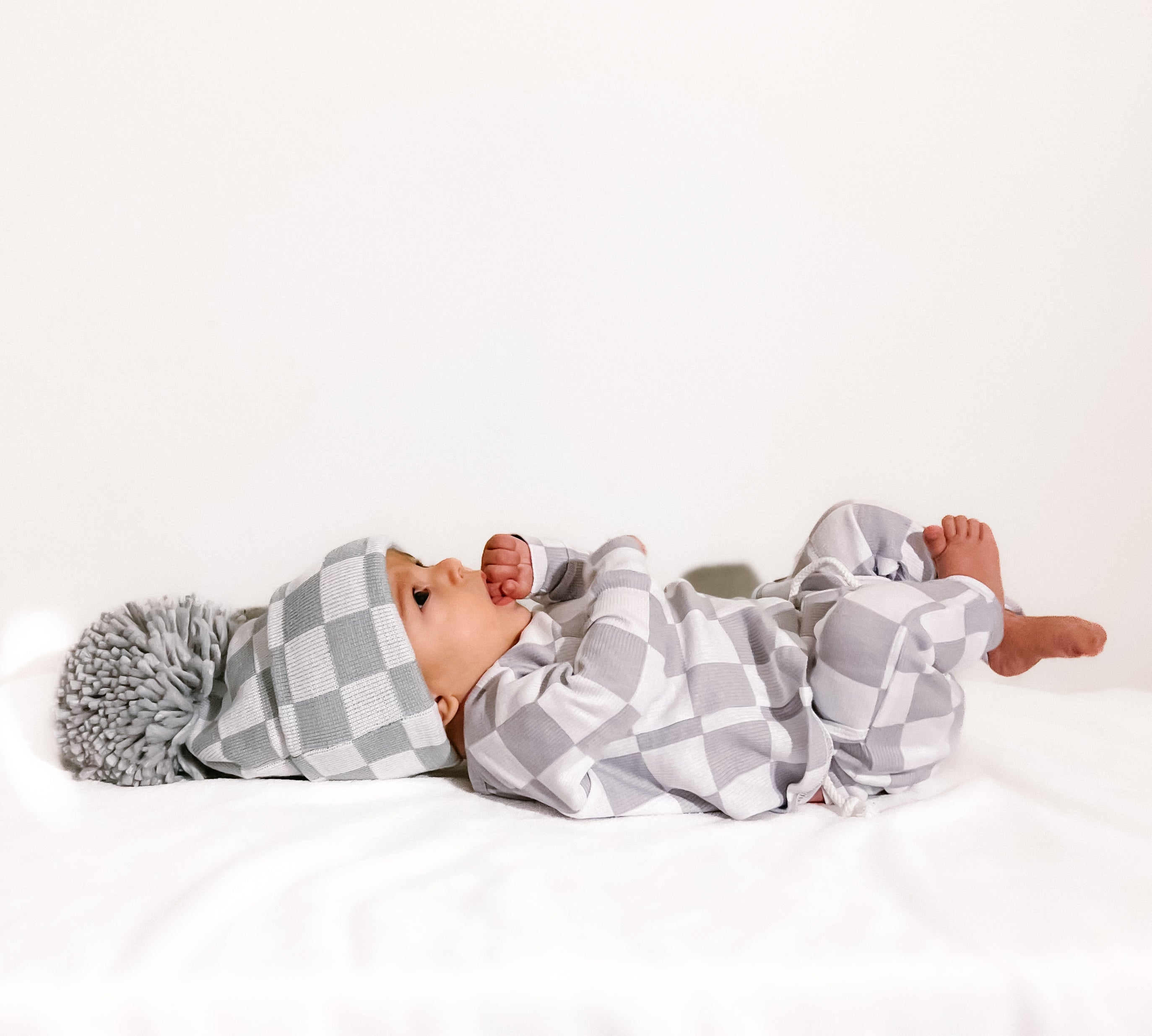 The Newborn Beanie — Pewter + White Checkered